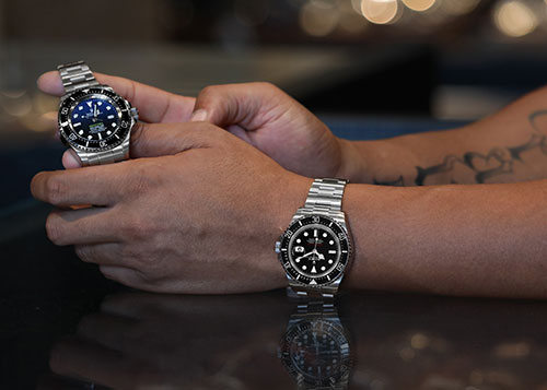 Photo of Rolex watch in hand